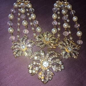 Floral gold tone necklace